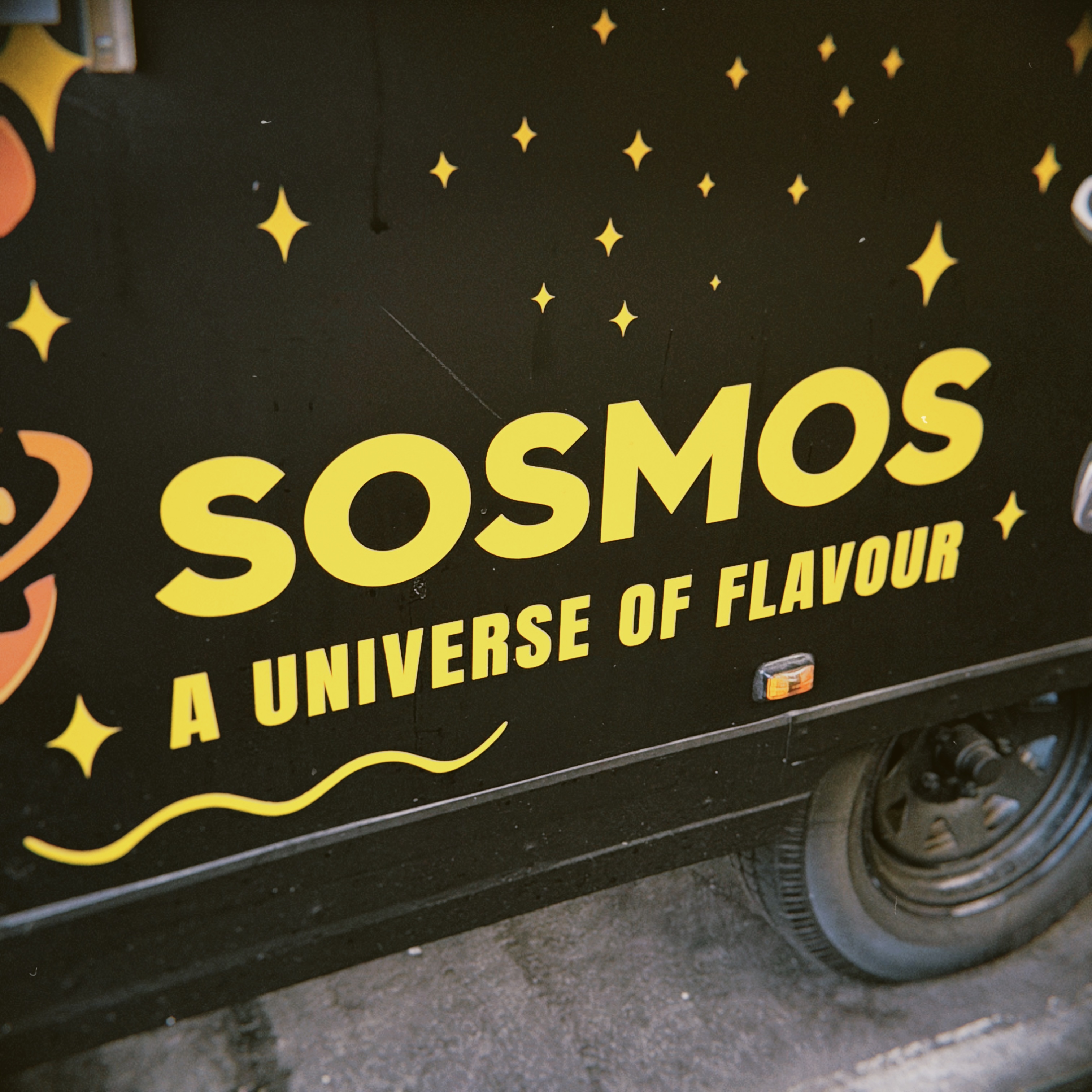 Hero background — food truck at Queen Victoria Market, vibrant and busy